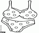 A set of women's underwear. Set of panties and bra decorated with polka dots and lace