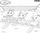 The Backyardigans Pablo, Uniqua and Austin are sitting on a bench in the garden behind the house