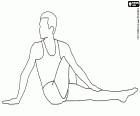 A gymnast doing stretches on the floor