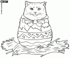 A cat with a bow around its neck inside an Easter egg in a nest